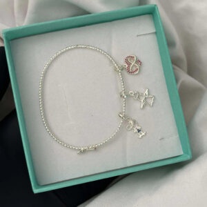 PULSEIRA FIO TORCIDO COM 3 BERLOQUES